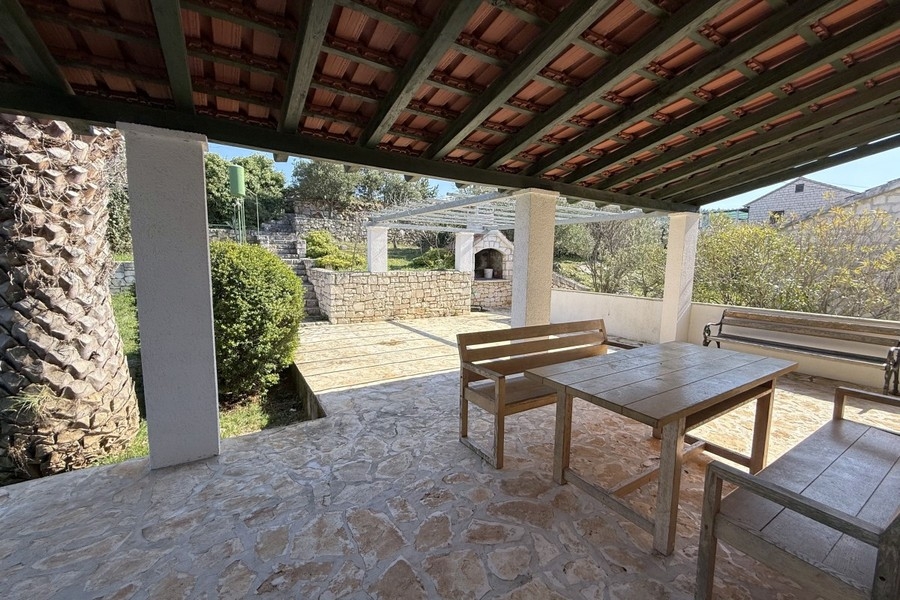Covered terrace with seating area