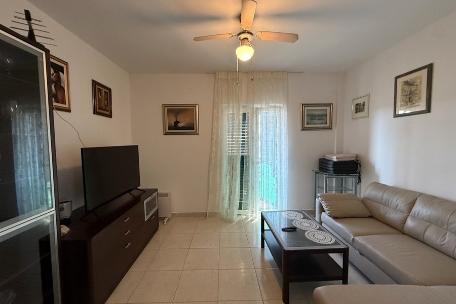 Living area with sofa and terrace access