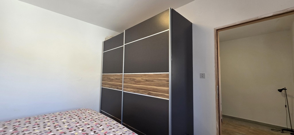 Room with built-in wardrobe