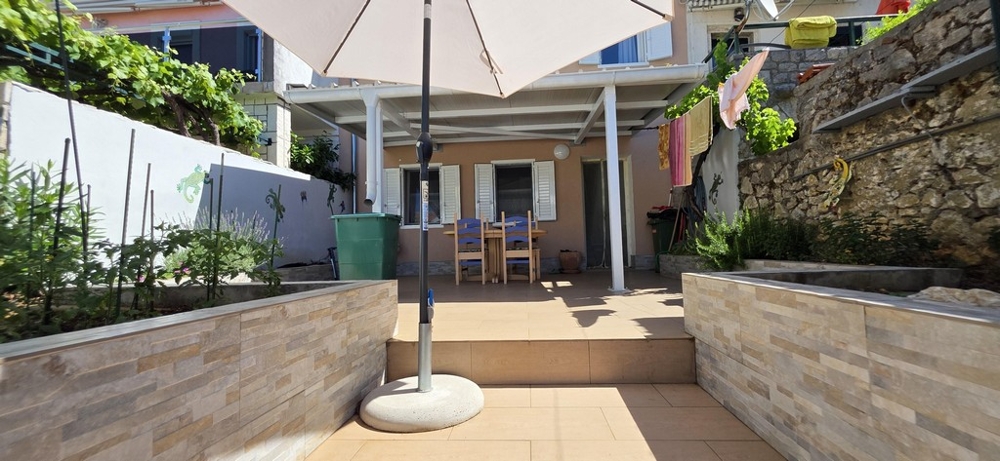 Covered patio with outdoor seating area