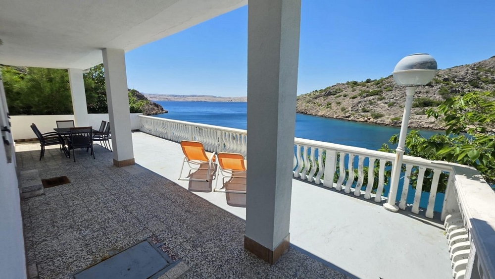 Large terrace with seating by the sea