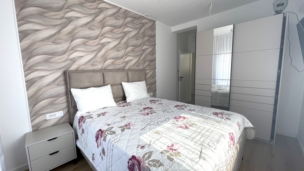 Bedroom with decorative wall design