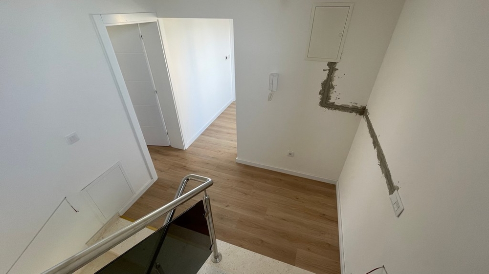 Interior staircase with glass railings