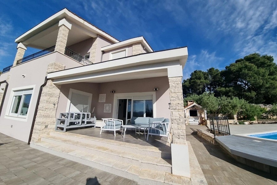 Exterior view of the villa with covered terrace