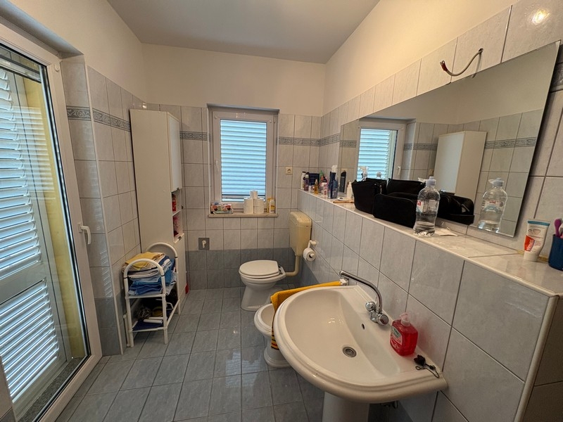 Bathroom with toilet and sink