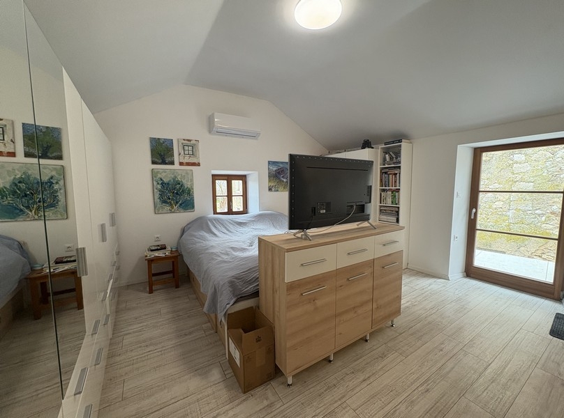 Bedroom with double bed and air conditioning