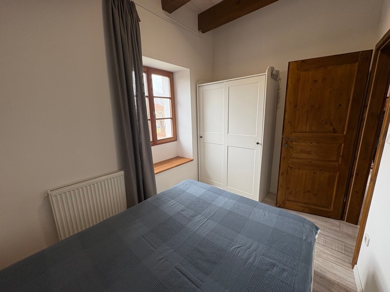 Bedroom with double bed and wardrobe