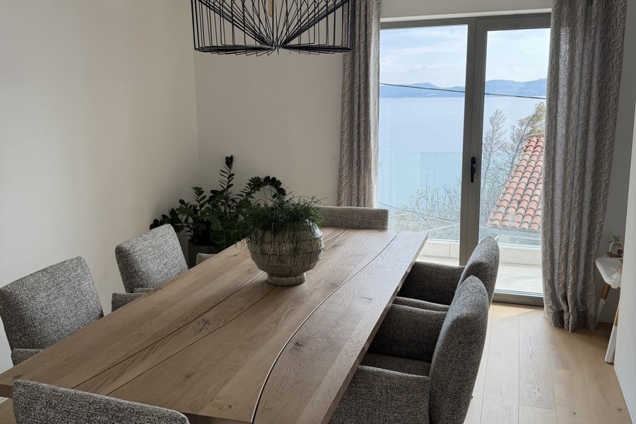 Seating area with table and sea view