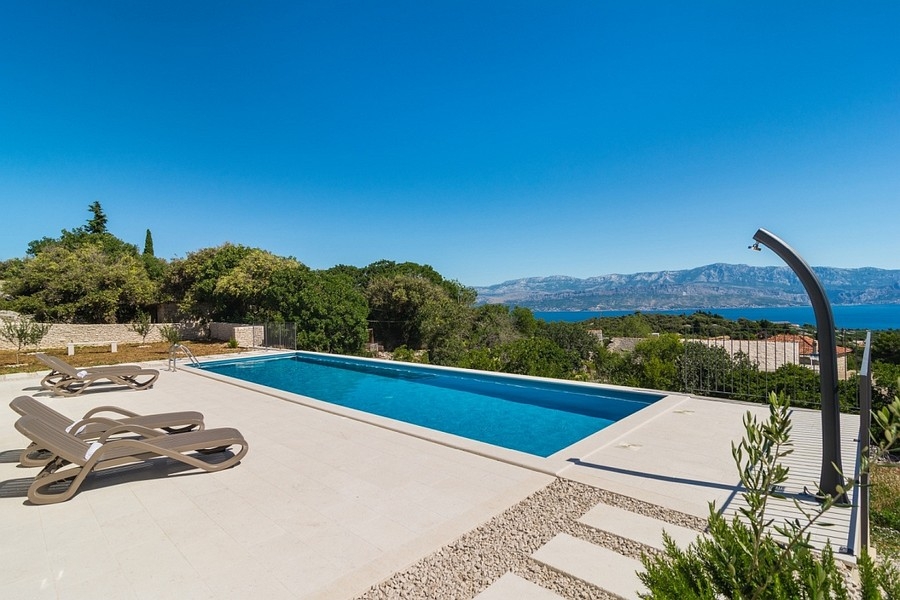 Pool area with panoramic sea views