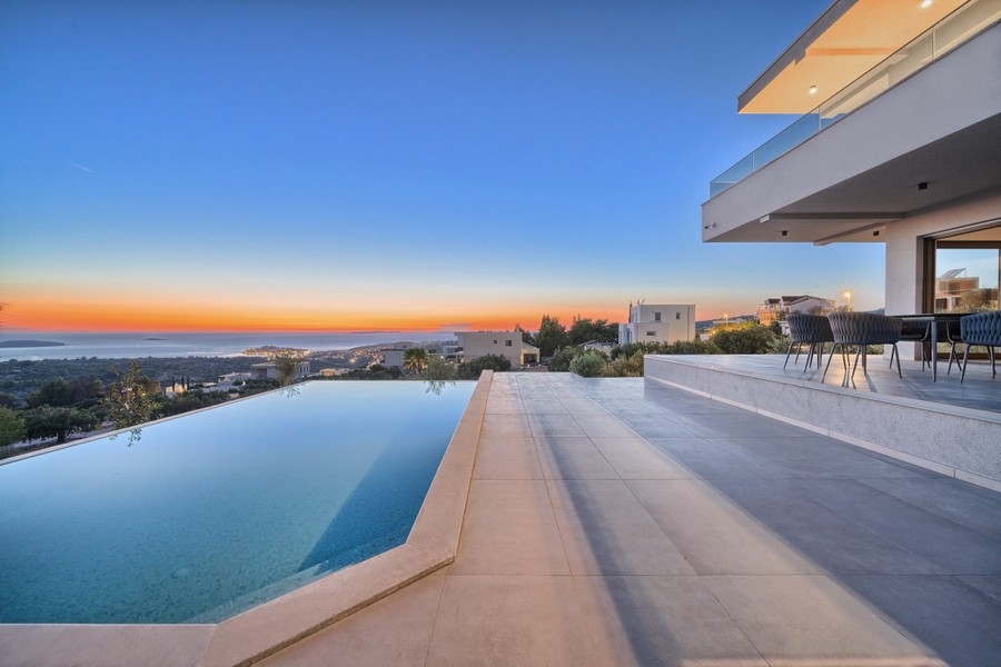 Infinity pool with sea views at sunset