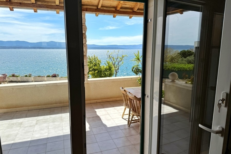 Living room with large windows and sea views