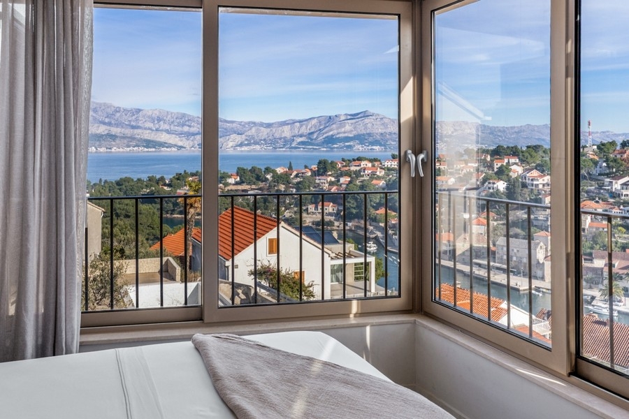 Large window front with a view of the sea