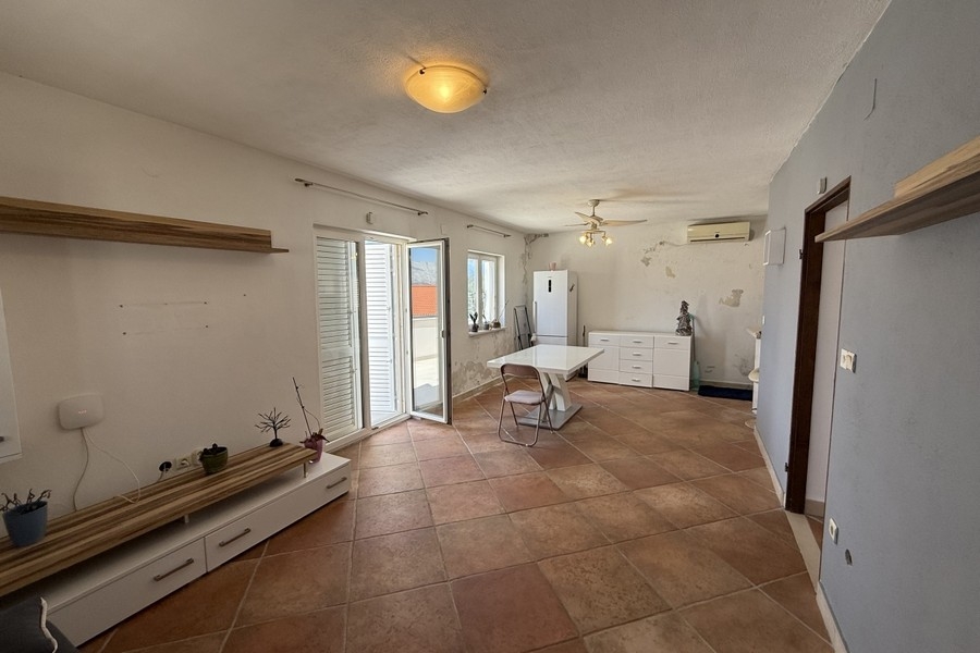 Bright living area with tiled floors