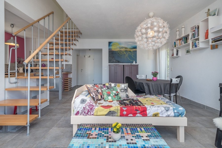 Open plan living area with internal staircase