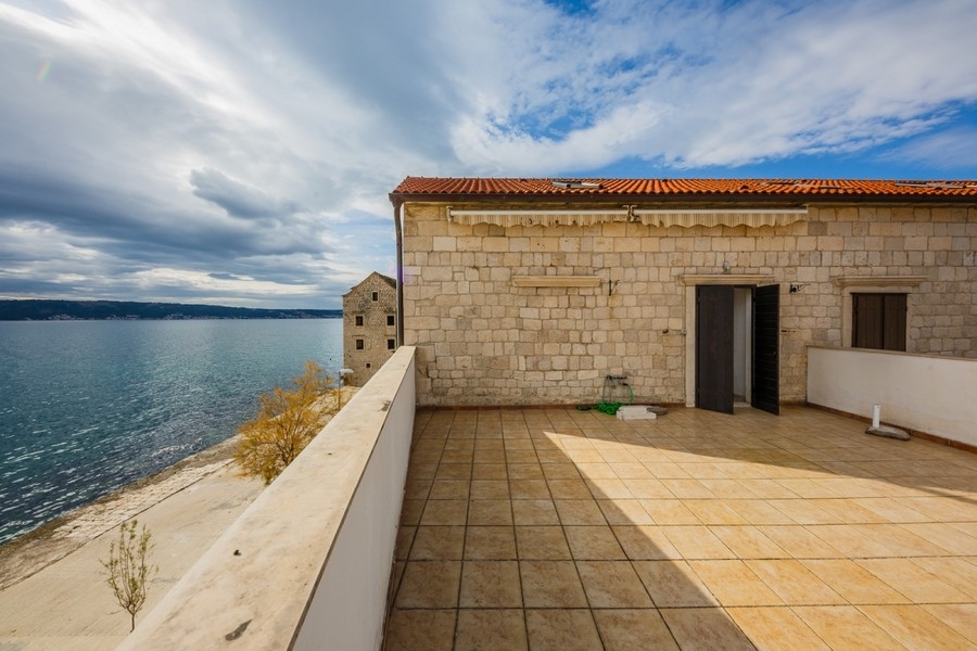 Stone facade overlooking the open sea