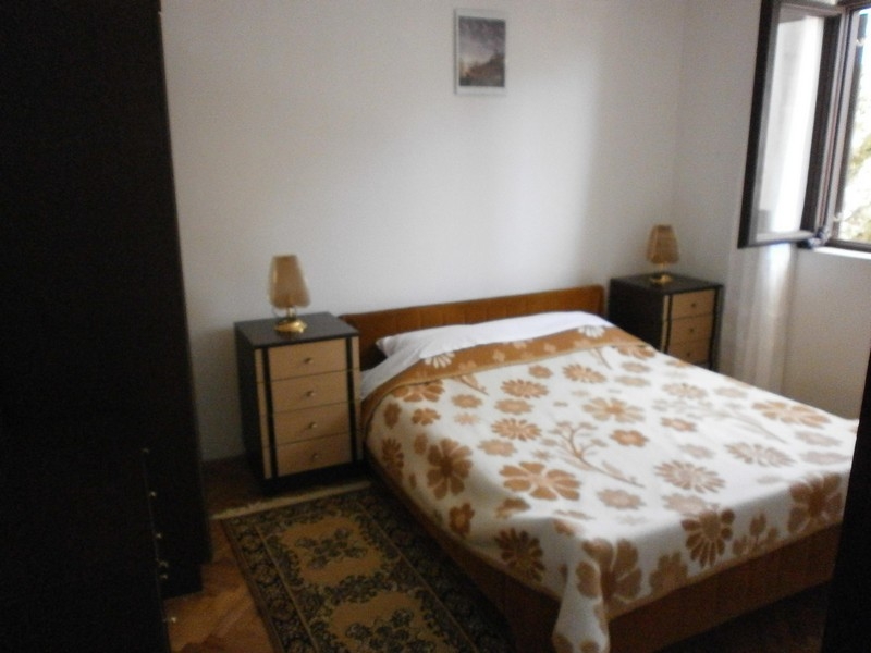 Bedroom with double bed and bedside tables in Croatia