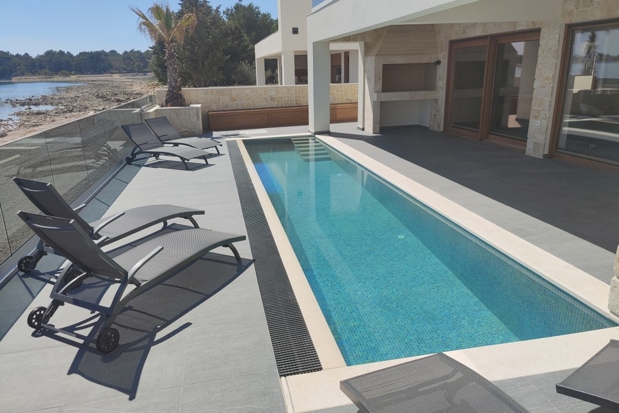 Swimming pool and sun terrace of the villa in Croatia