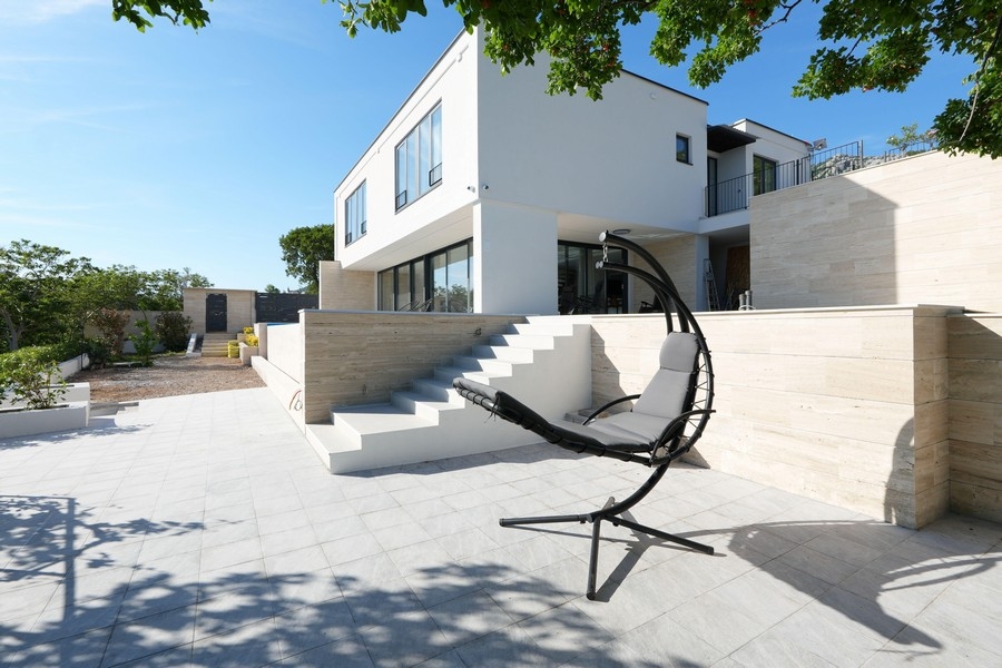 Sun terrace of the villa with hanging chair