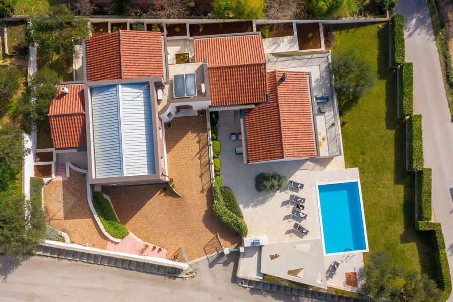 Aerial view of villa, pool and garden