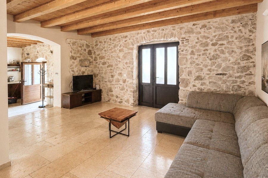 Living area with natural stone wall in Croatia