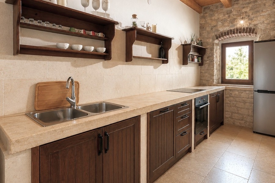 Kitchen with natural stone wall
