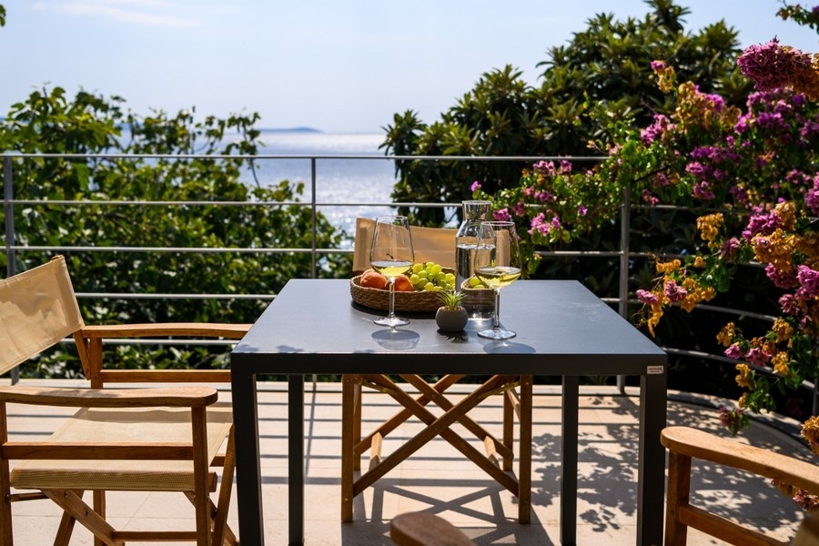 Sun terrace with table and sea view in Croatia