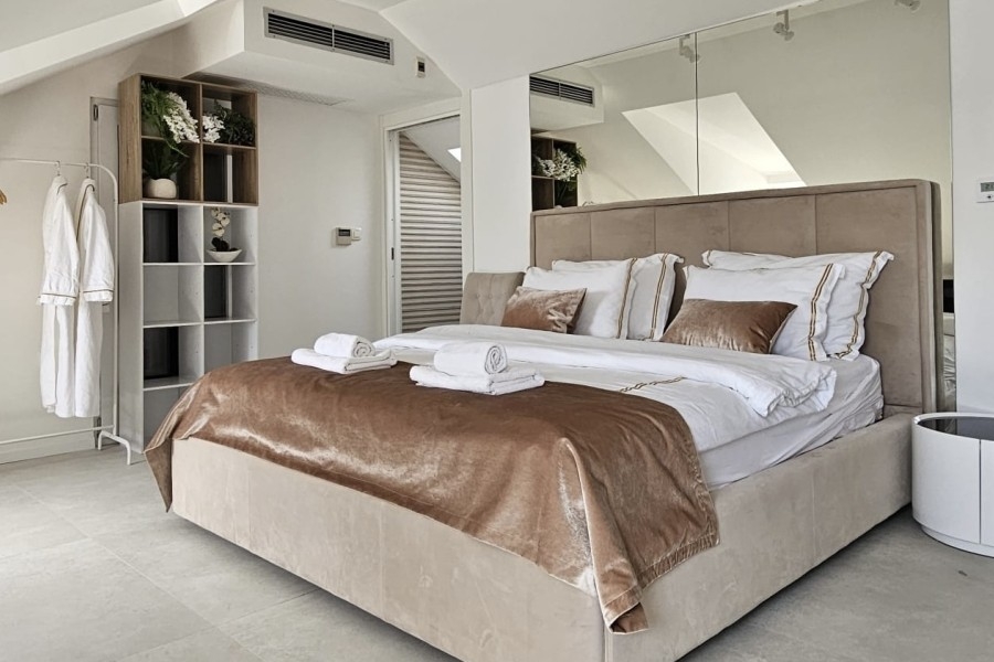 Bedroom with double bed and built-in wardrobe