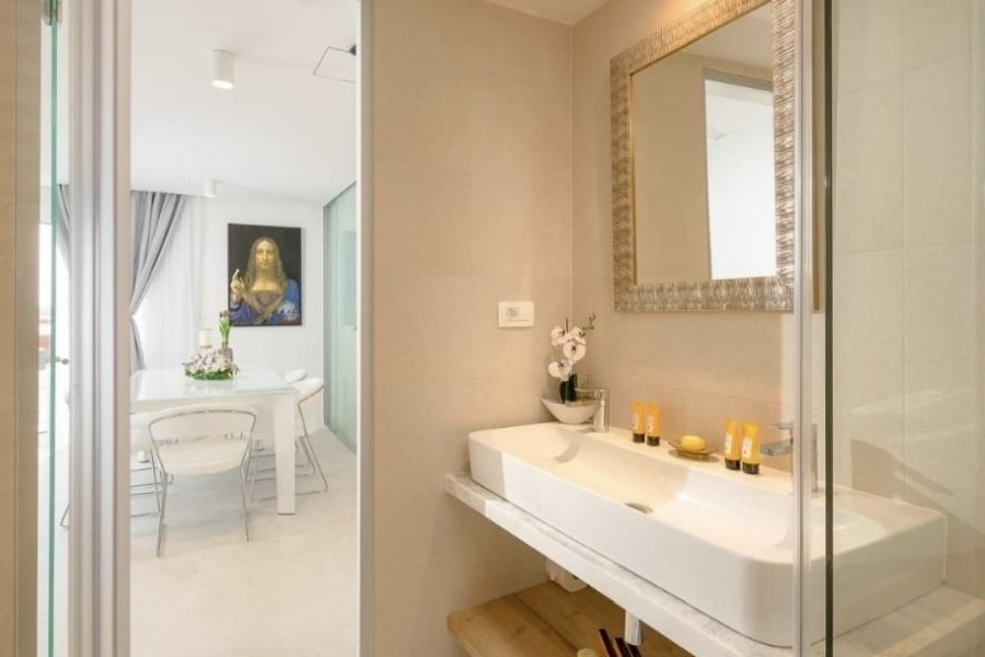 Bathroom with sink and mirror