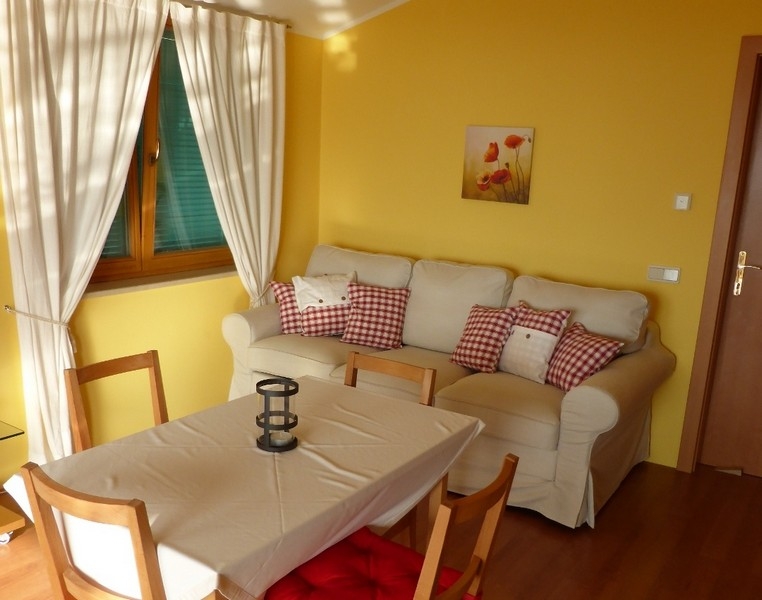 Living room with sofa in warm colors