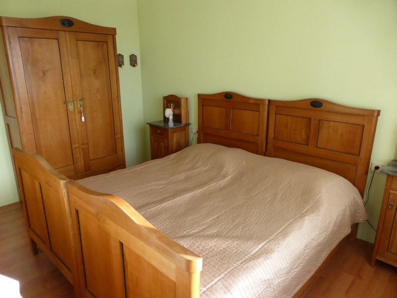 Bedroom with wooden bed