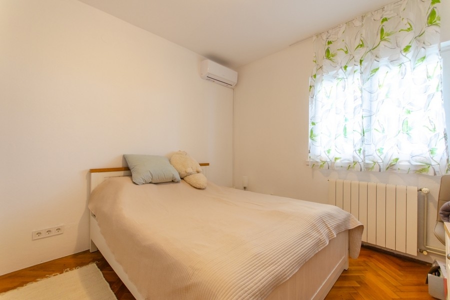 Bright bedroom with double bed