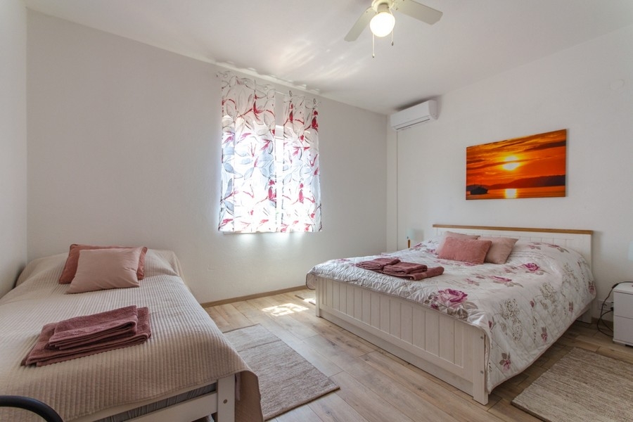 Bedroom with double and single bed