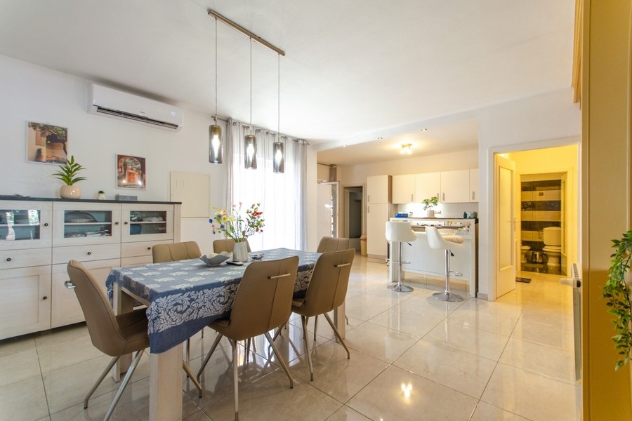 Dining area with open kitchen in Croatia
