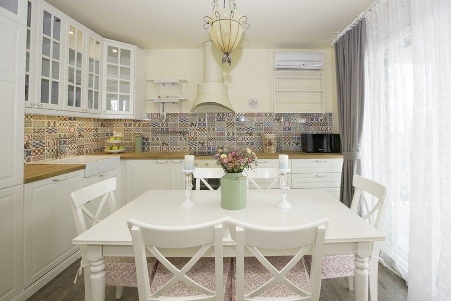 Classic white kitchen with table