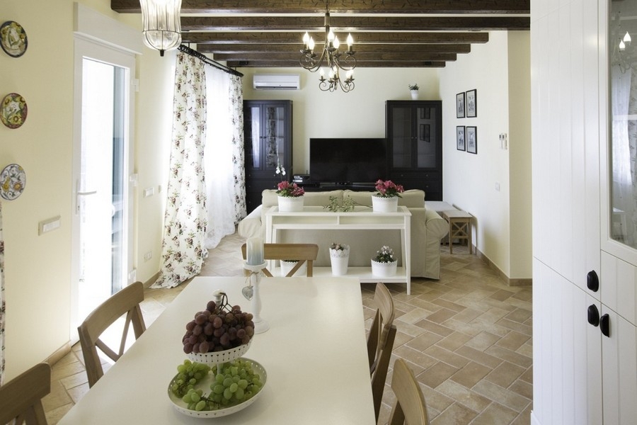 Bright living area with wooden beamed ceiling in Croatia