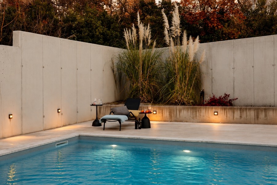 Pool area with sun lounger