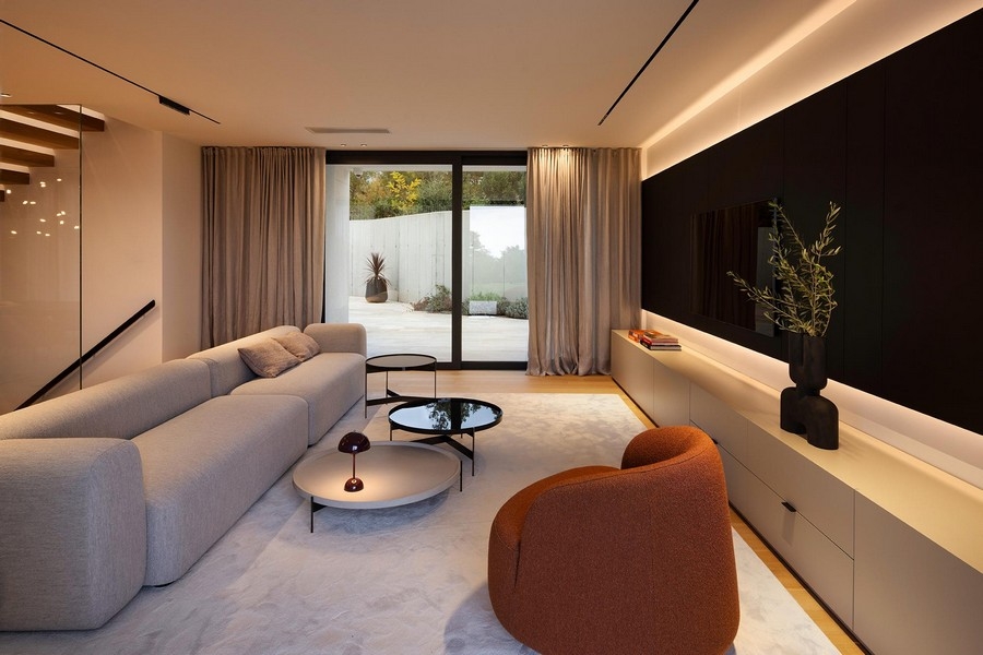 Living area with sofa and indirect lighting
