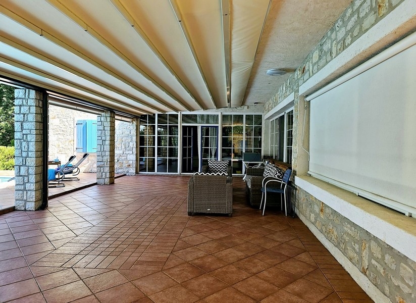 Covered terrace with seating area
