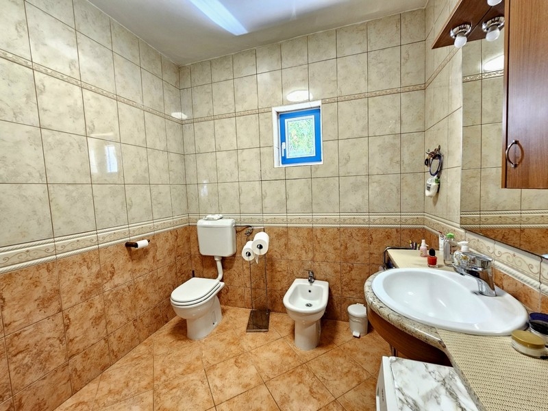 Bathroom with toilet and bidet