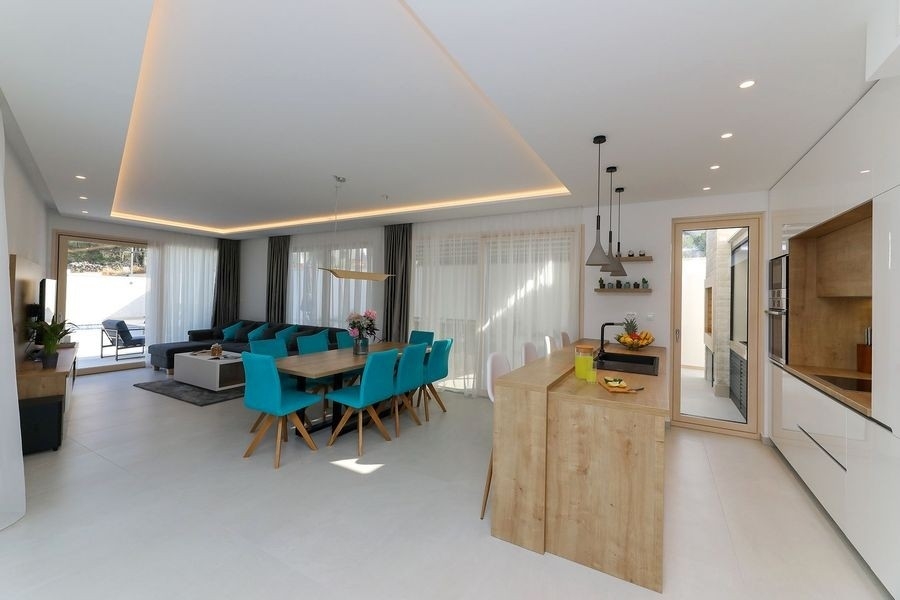 Open living area with kitchen and dining table