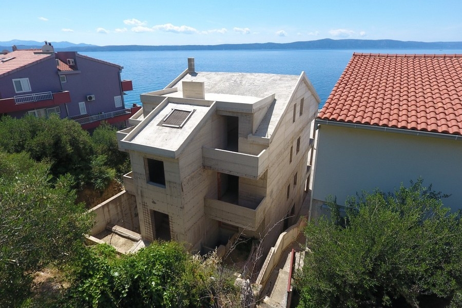 Aerial view of the apartment house next to the sea