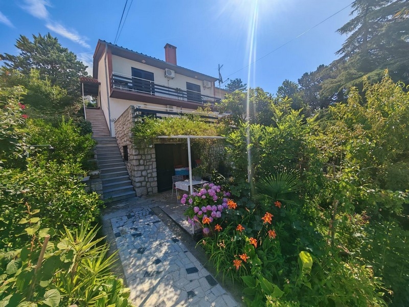 Garden with flowers and path to the house