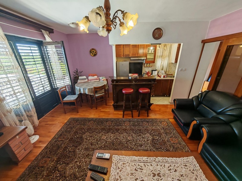 Living area with kitchen and seating area