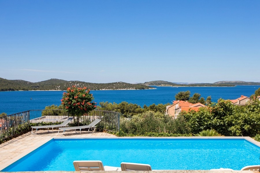 Swimming pool with sea and island views