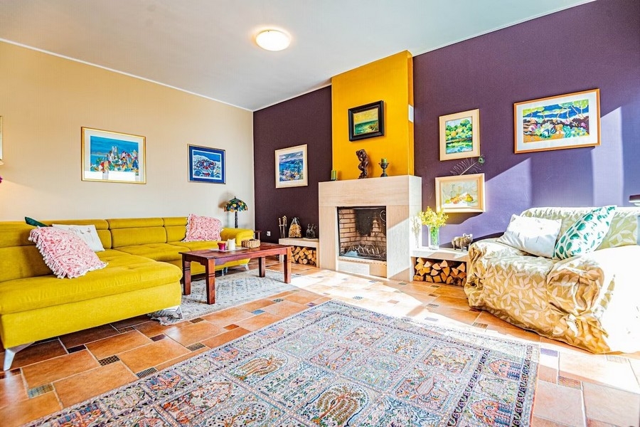 Living area with fireplace and sofa area