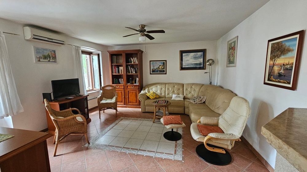 Living room with sofa and air conditioning