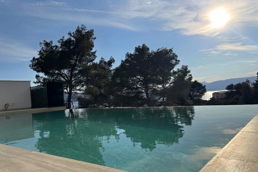 Villa swimming pool at dusk