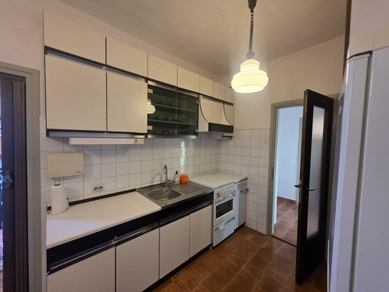 Kitchen with built-in appliances