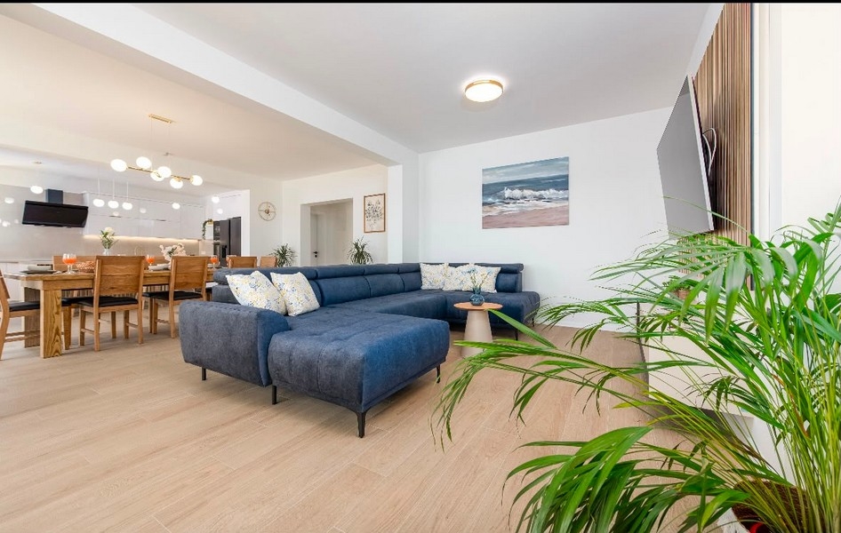 Living area with sofa and open floor plan