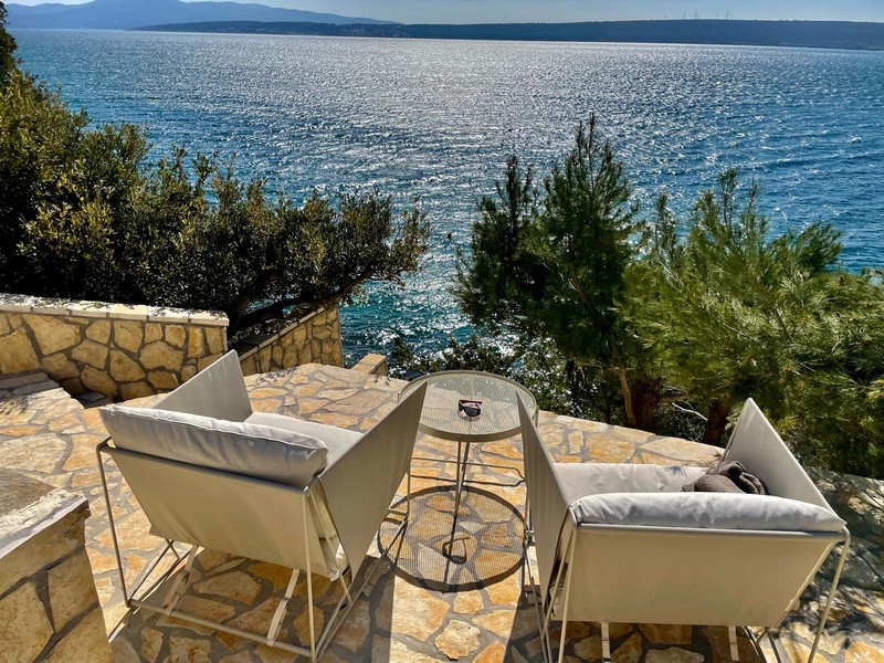 Terrace with lounge furniture and sea views